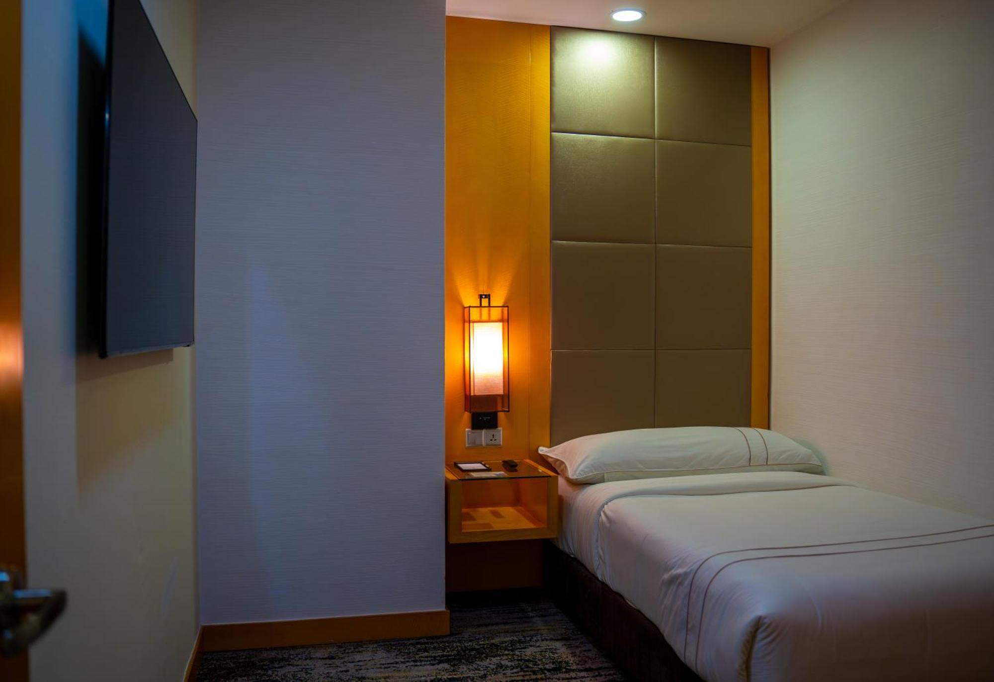 The Waterfront Hotel Kuching Dış mekan fotoğraf A room at the hotel