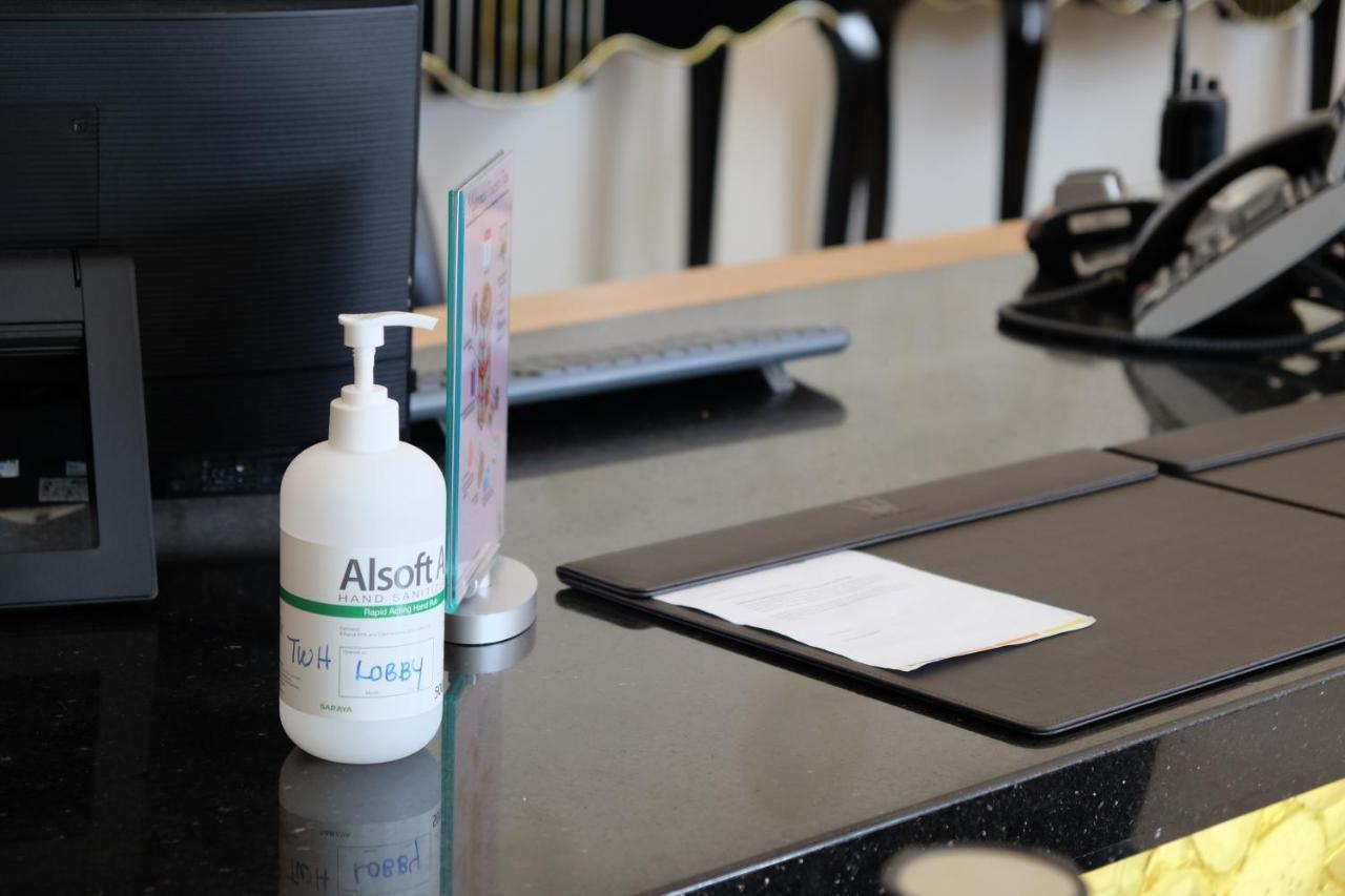 The Waterfront Hotel Kuching Dış mekan fotoğraf A bottle of hand sanitizer